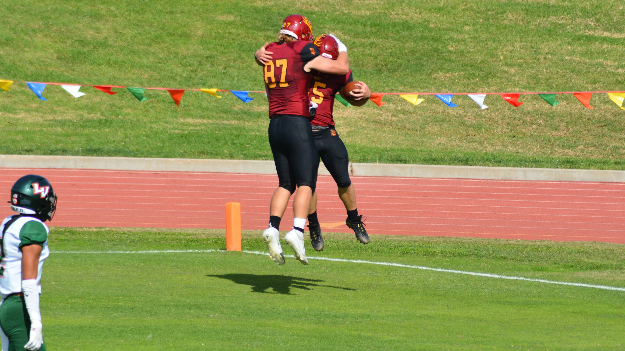 Justin Edwards celebrates a TD with Will Smith, who later caught a TD of his own (photo by Tessa Guerra)