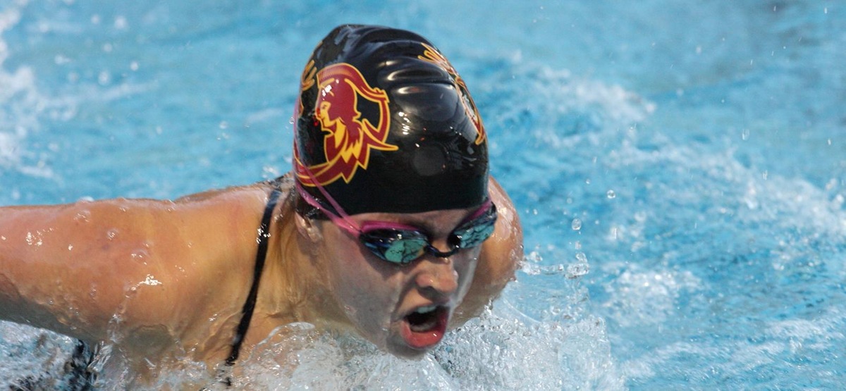 Liv Baker of the CMS women's swimming team in a meet against Occidental College.