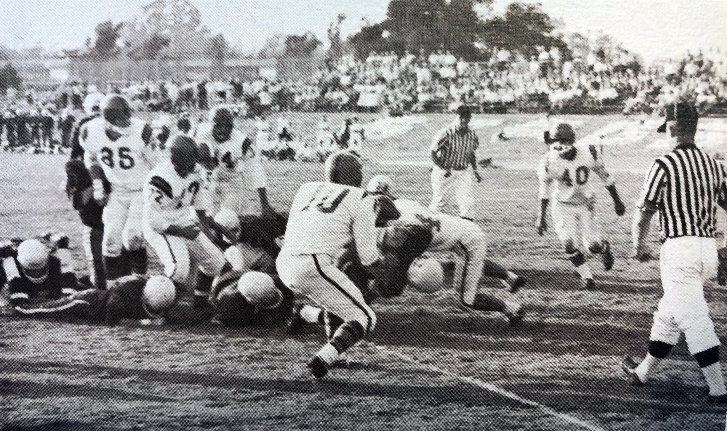 The 1960 football team in action