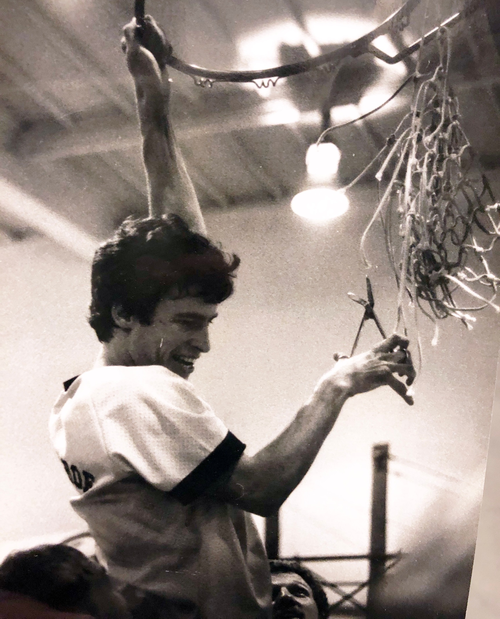 Dale Donohoe cutting down the net