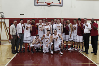 The team after cutting down the Ducey Gymnasium nets
