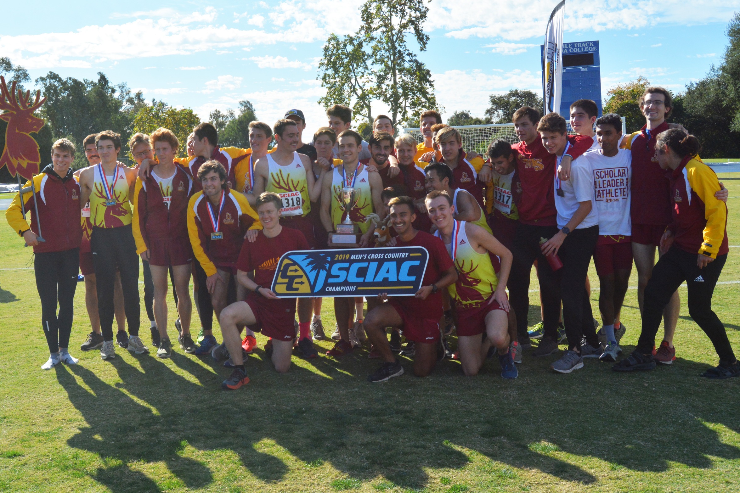 CMS celebrating with the SCIAC banner