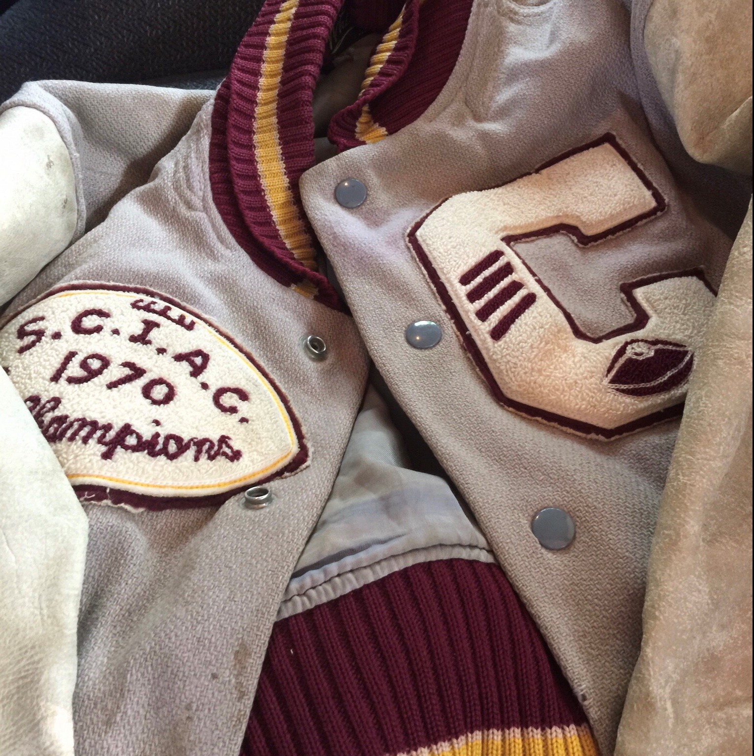 A letter jacket displaying a SCIAC championship patch