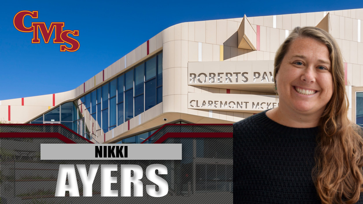 Nikki Ayers head shot with Roberts Pavilion behind her