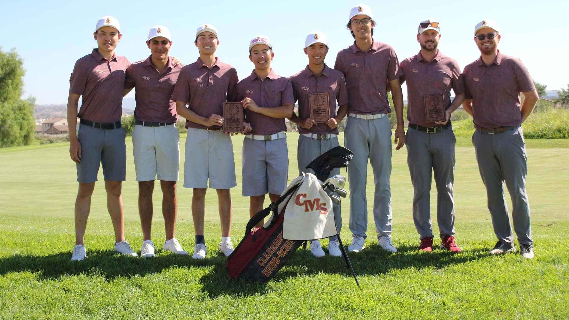 CMS men's golf holds the championship trophy
