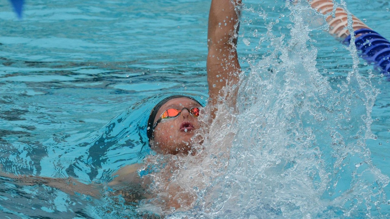Anderson Breazeale swimming the backstroke