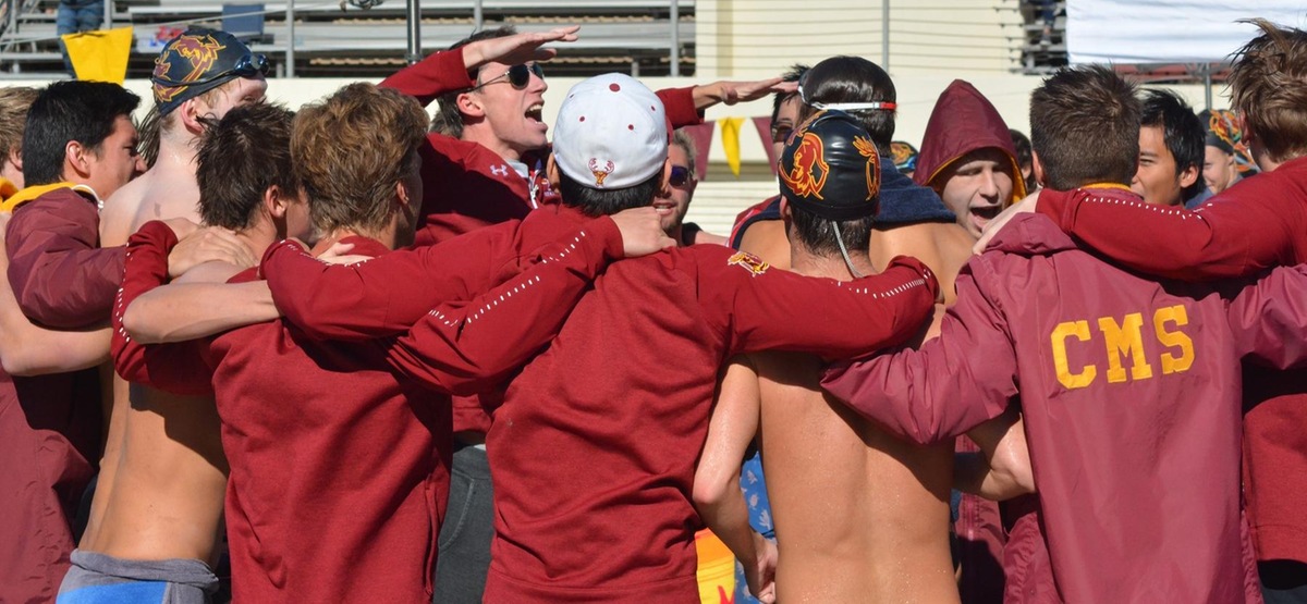 CMS Men's Swimming and Diving team huddle