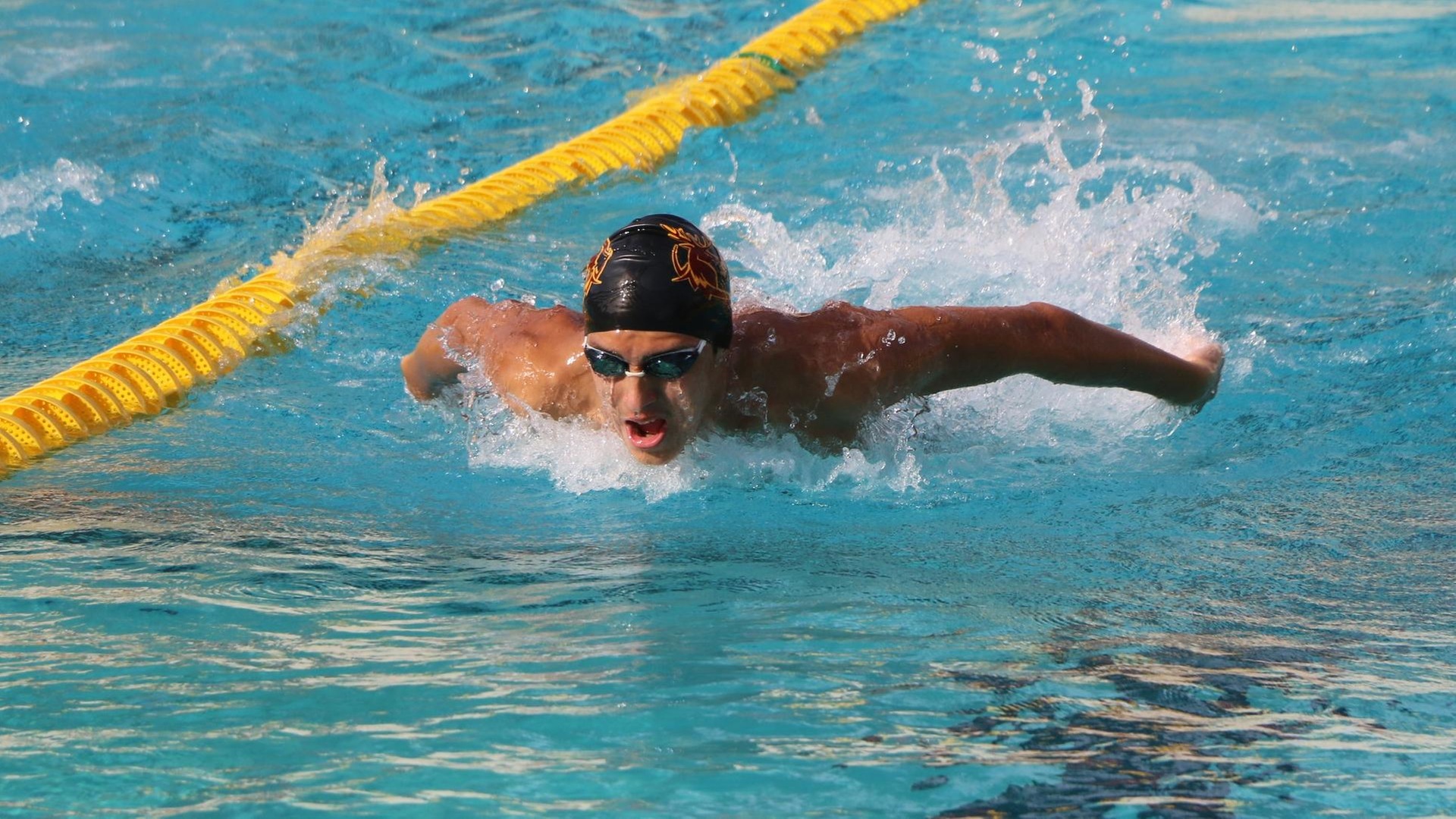 Henrik Barck won both the 200 fly and the 400 IM (photo by Stella Chang)