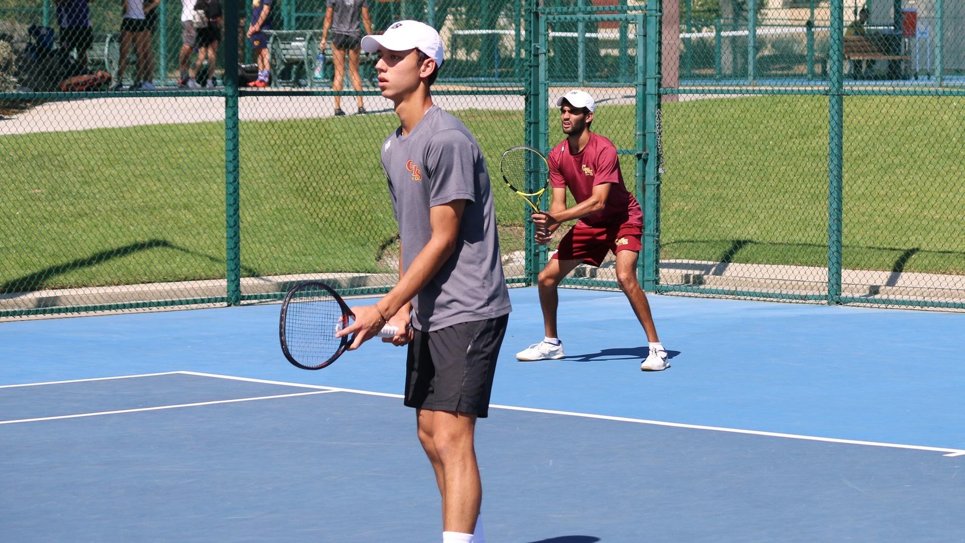 Philip Martin (foreground) and Nathan Arimilli won twice on Friday to advance to the finals