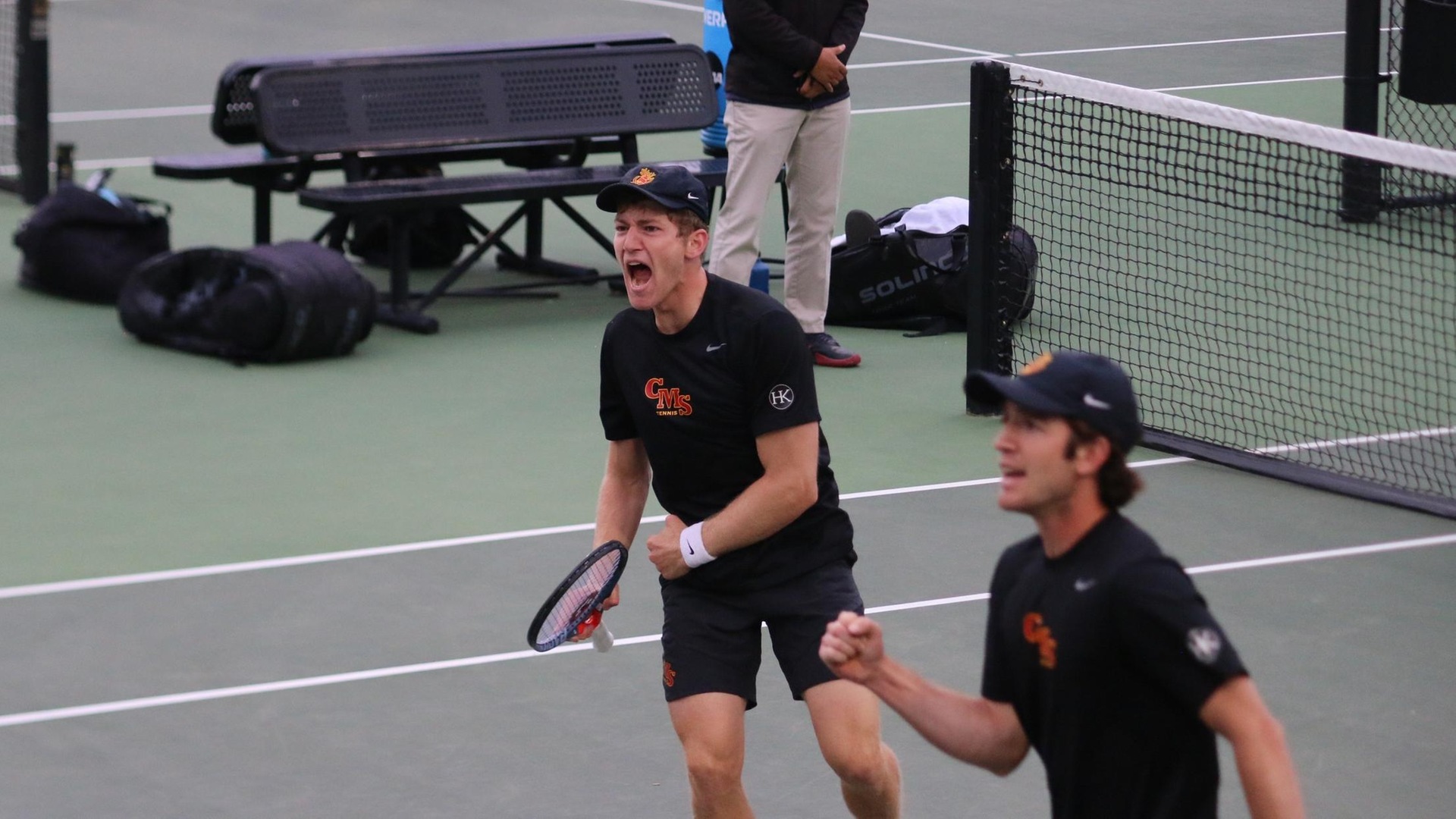 Matthew Robinson and Ian Freer celebrate their 8-6 doubles win