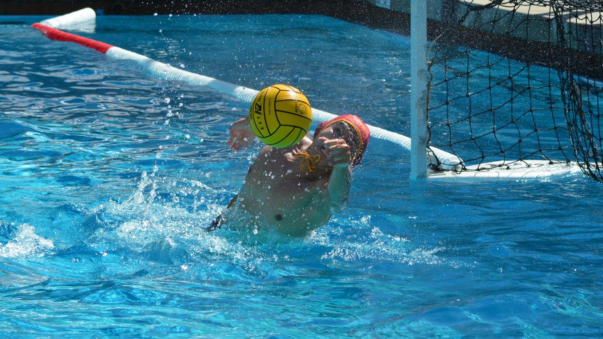 Noah Smith makes one of his 25 saves on the day (photo by Tessa Guerra)