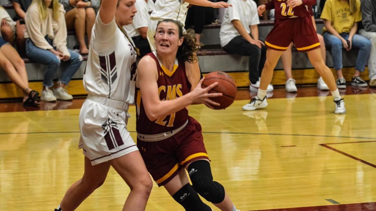 Lindsey Cleary drives to the basket during the SCIAC Championship game