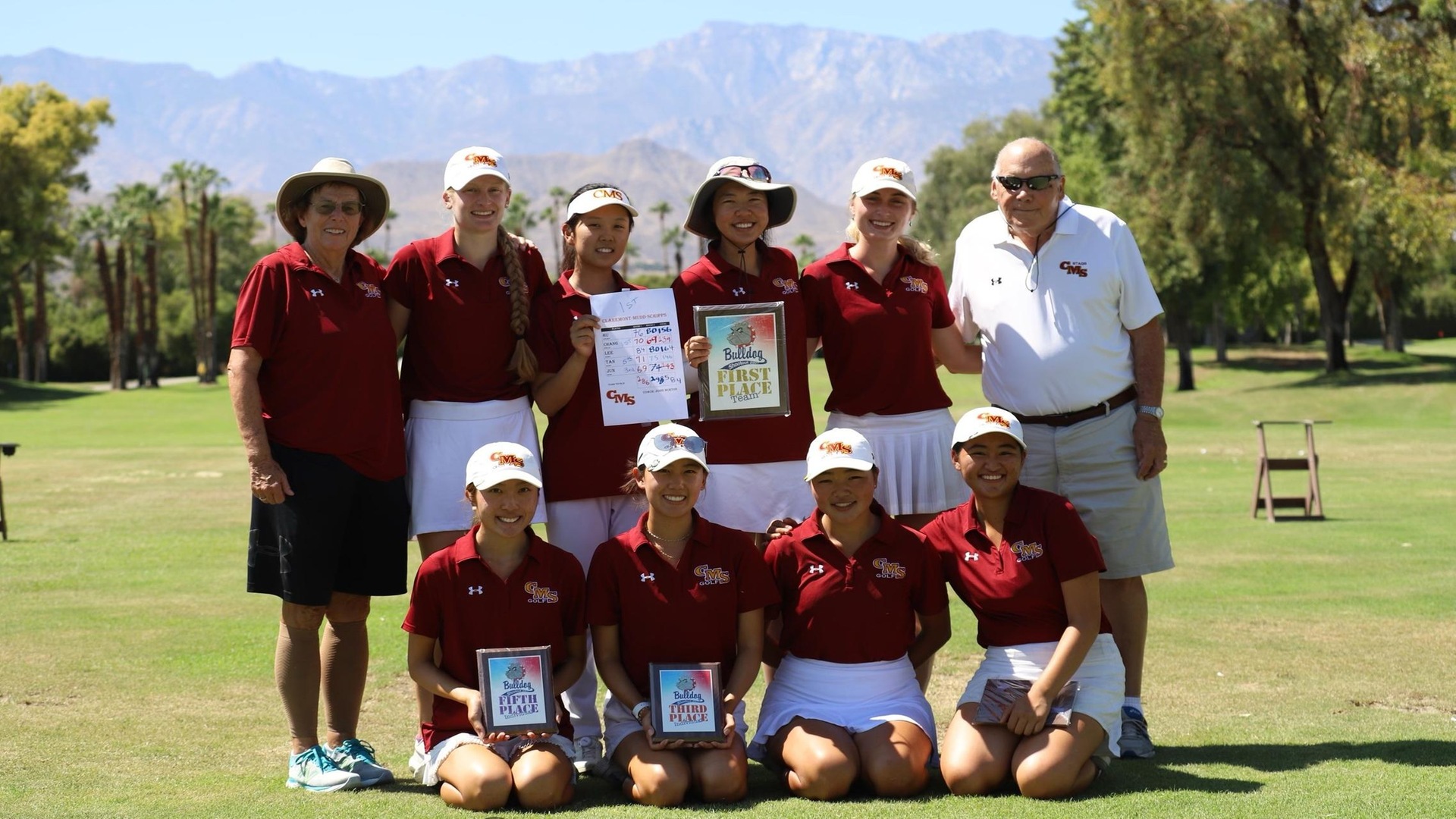 The Athenas with the championship trophy from the Redlands Fall Invite
