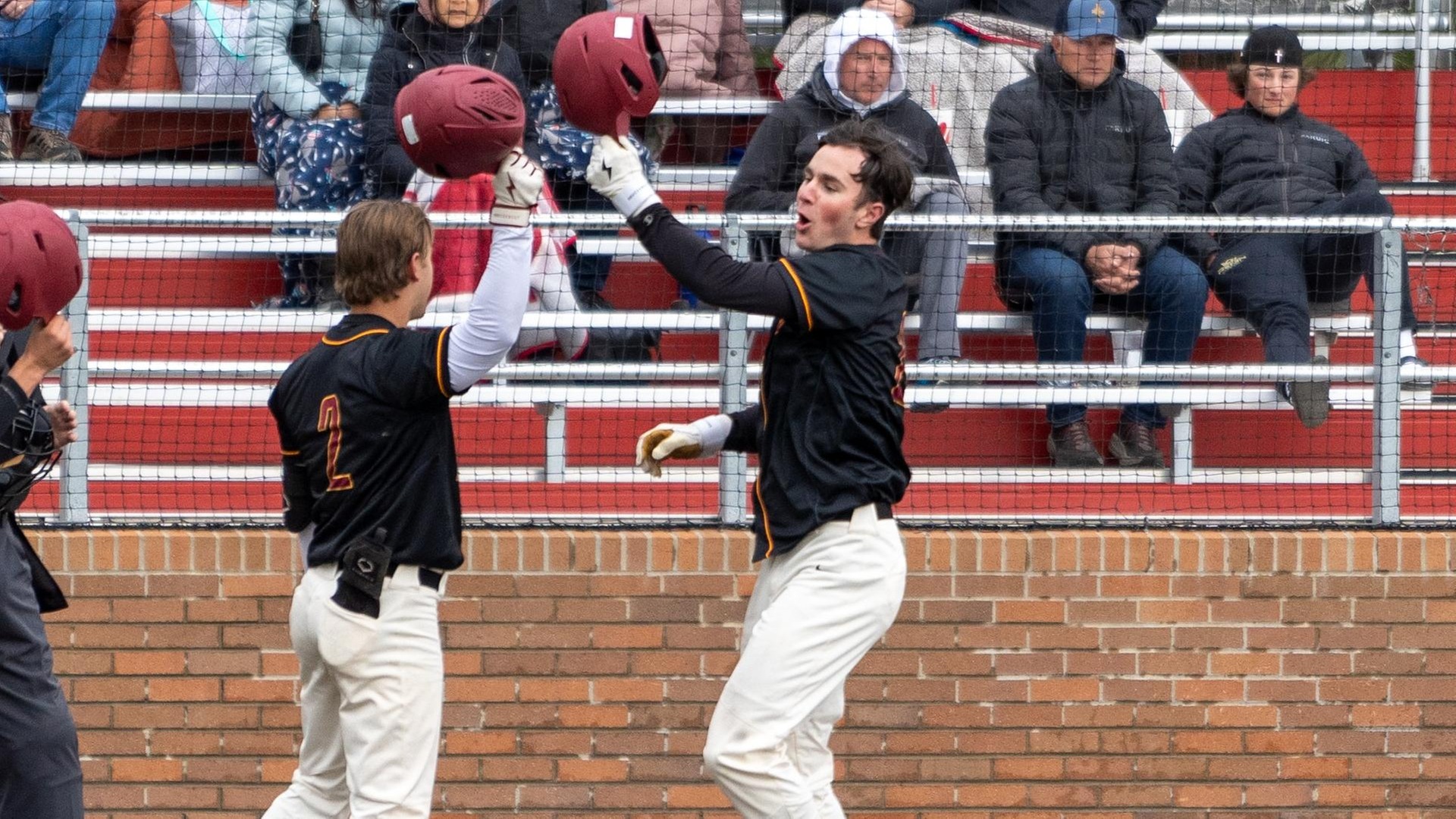 Bryce Didrickson (right) celebrates one of his home runs (photo by Caleb Flegel)