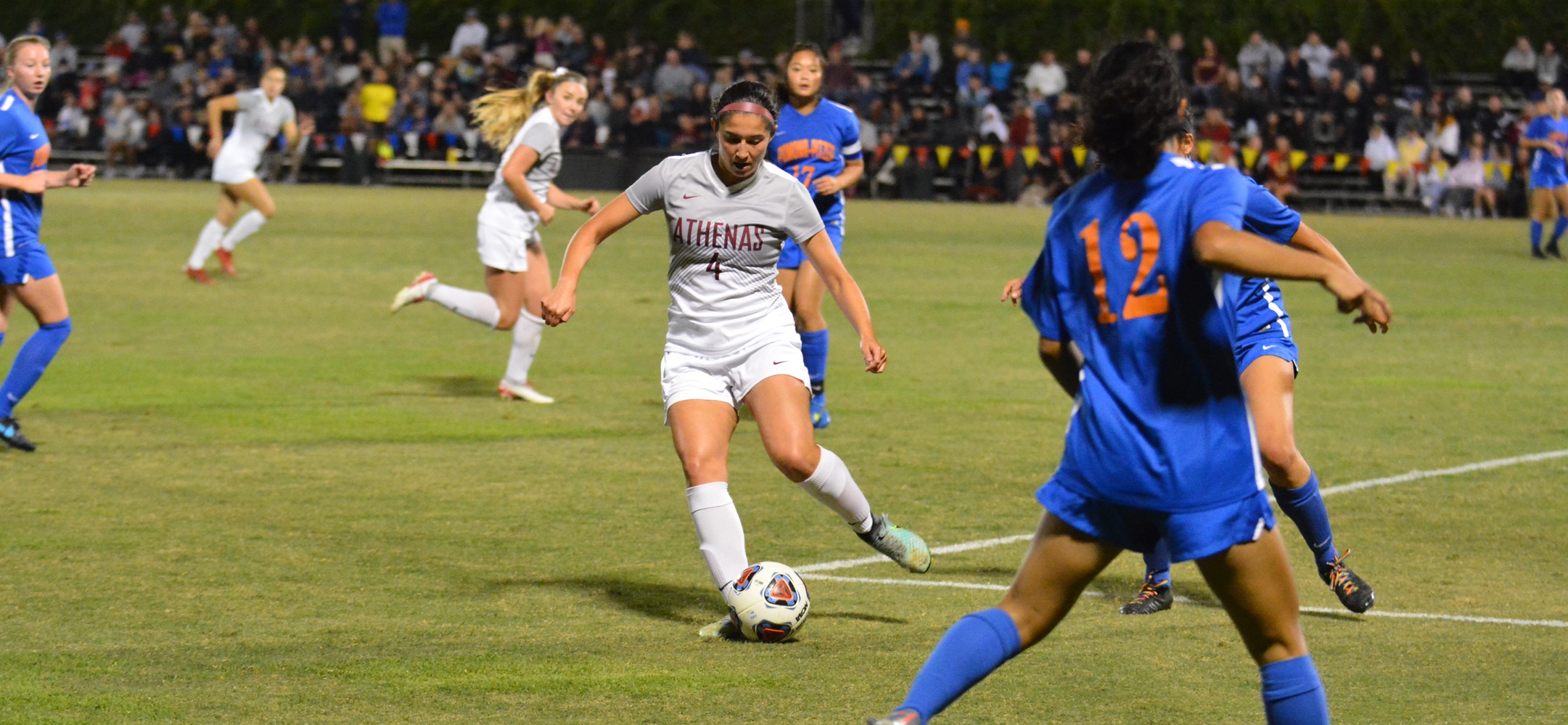 Sarah Tocher battles for the ball in offensive third against Pomona-Pitzer (photo by Tessa Guerra)