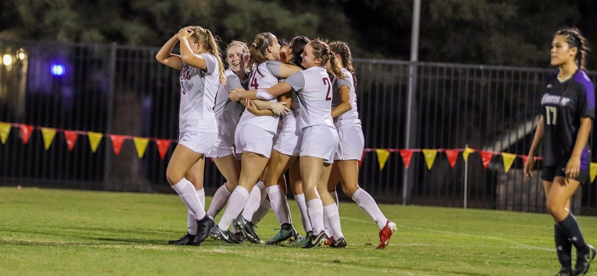 CMS celebrates one of its three goals in its 3-0 win over Whittier (photo by Daniel Addison)