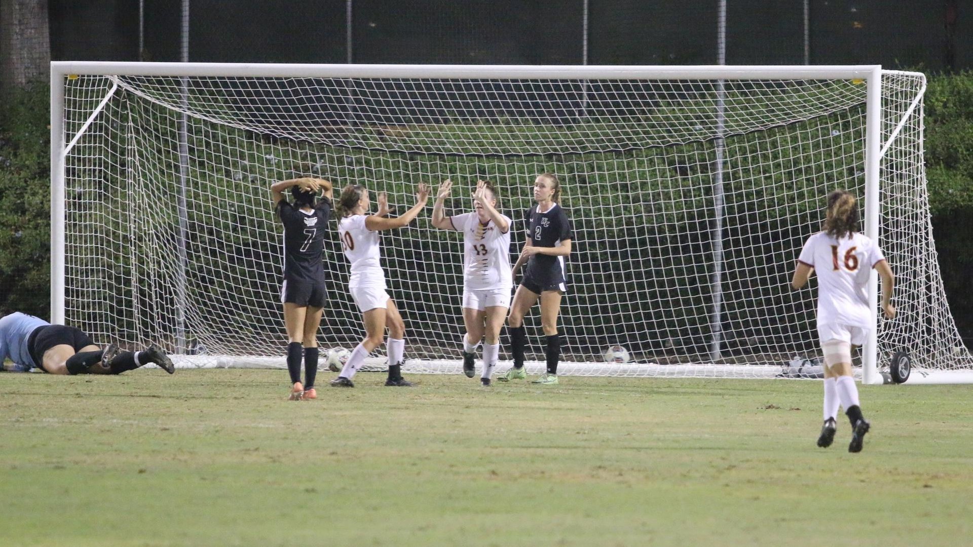 Riley Zitar and Kaitlyn Helfrich celebrate CMS' second goal (photo by Stella Cheng)