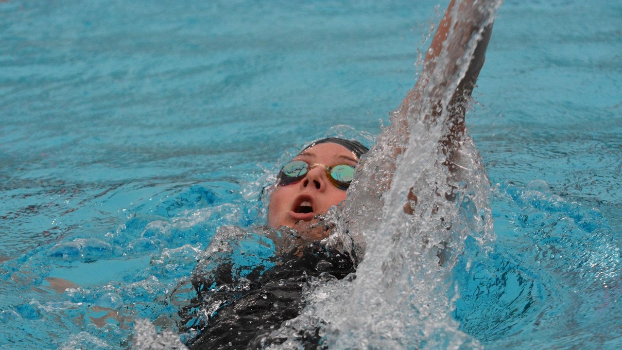 Christina Campbell swimming the backstroke