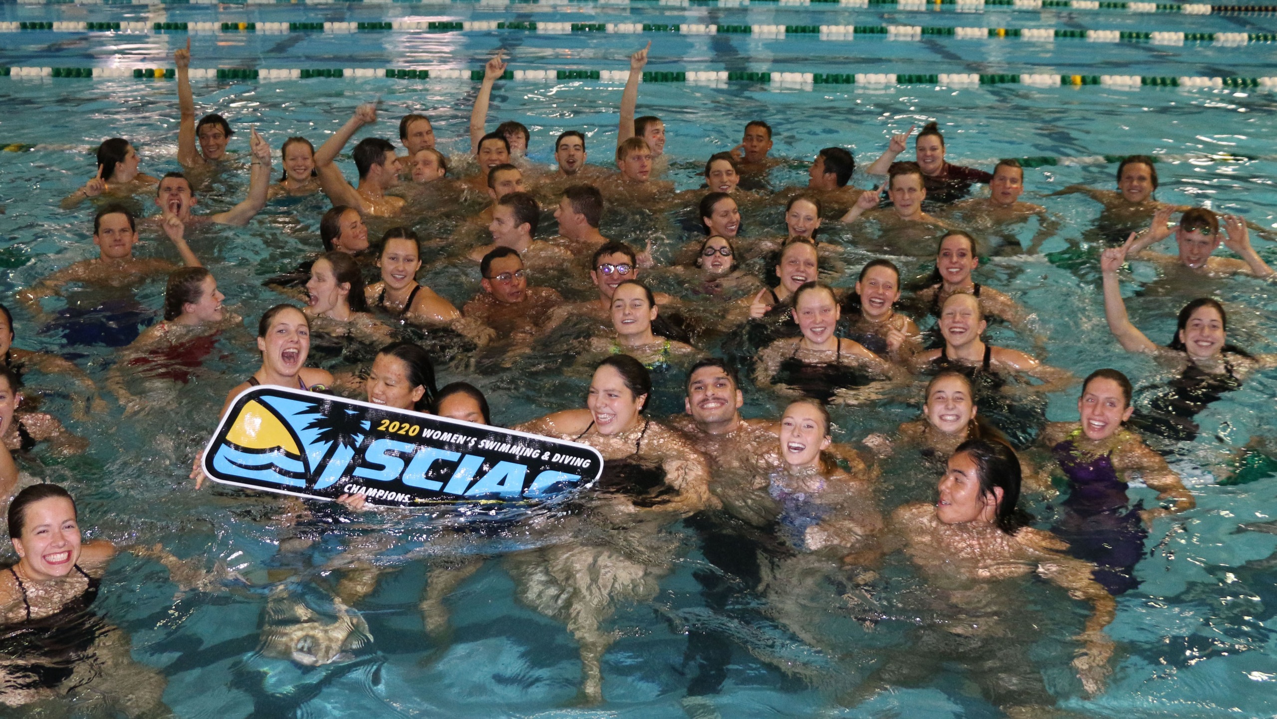The CMS swimming and diving teams celebrate their 2020 SCIAC titles