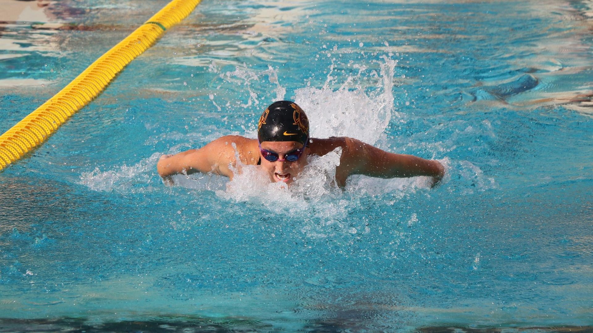 Mackenzie Mayfield earned 50 free/100 fly wins, as well as two relays (photo by Stella Cheng)