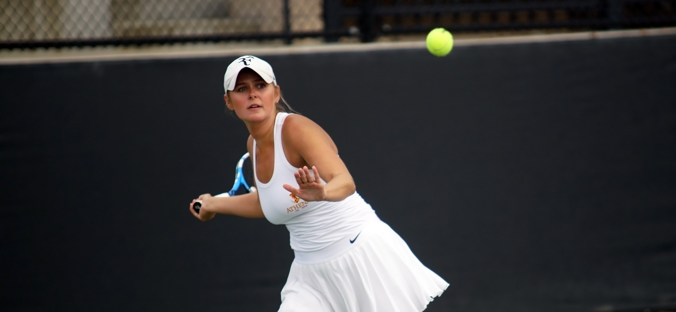 Caroline Cox was one of five Athenas to win in singles and doubles, picking up the clincher at No. 5 singles