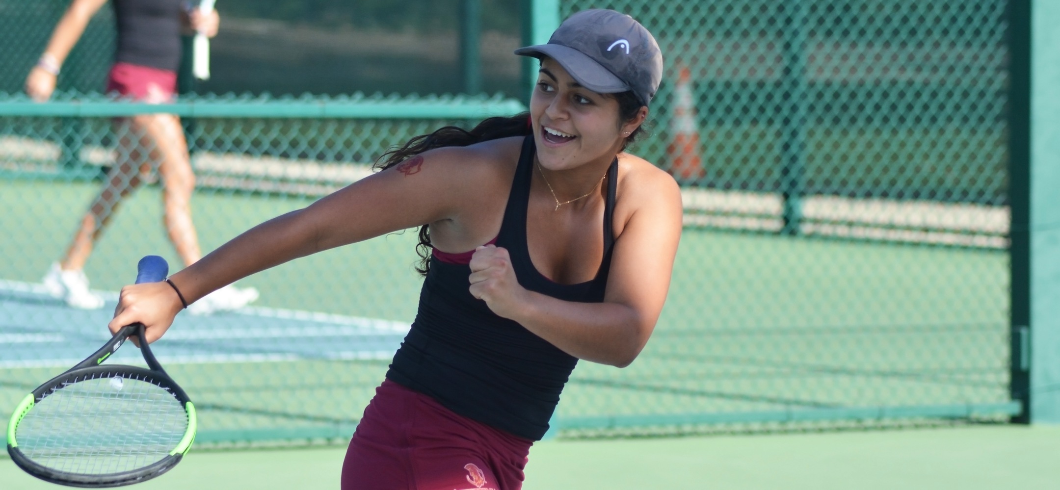 Sarah Bahsoun celebrates a winner at No. 2 doubles in a 7-2 win for CMS on Wednesday at Pomona-Pitzer