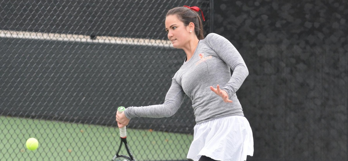 Senior Jessie Cruz won two singles matches while dropping only one game, winning 6-0, 6-0 and 6-0, 6-1