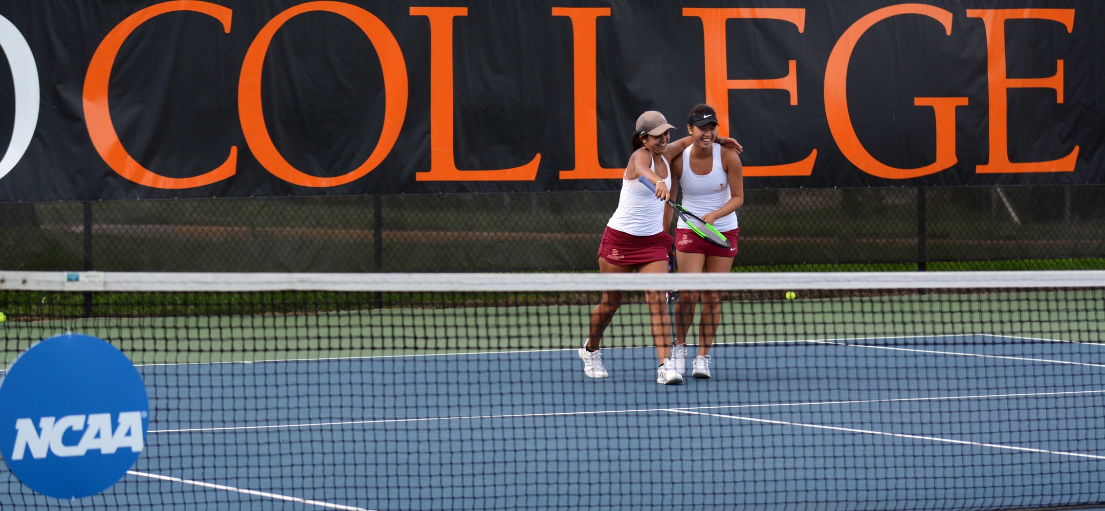 Sarah Bahsoun and Nicole Tan celebrate their three-set win in the NCAA Doubles Quarterfinals