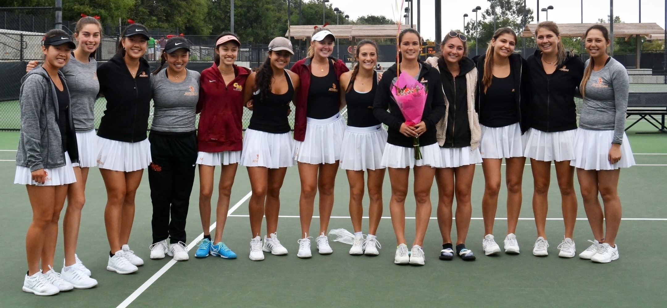 The CMS women's tennis team honored its lone senior, Jessie Cruz, prior to the match