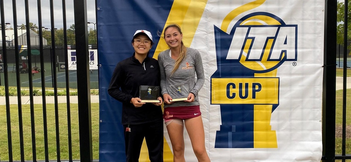 Justine Leong (left) and Catherine Allen (right) receive their ITA Cup Championship plaques