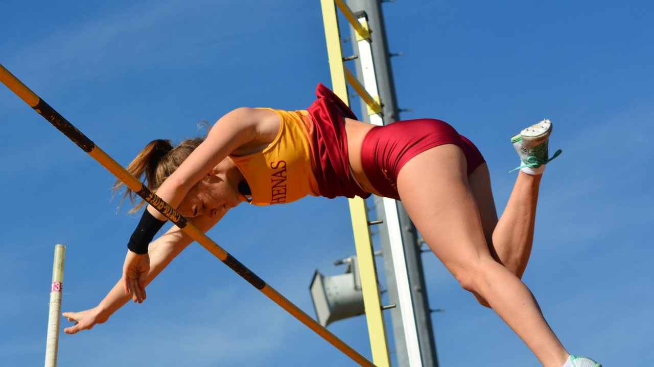 Brooke Simon clearing the bar for a successful pole vault