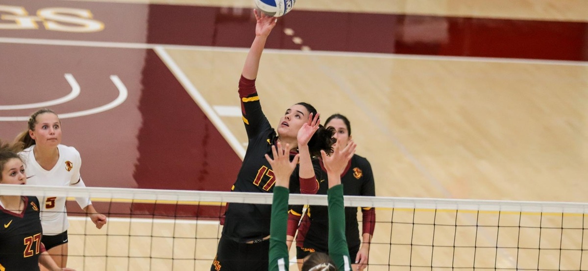 Melanie Moore had six kills and six blocks, including a solo block on match point (photo by Daniel Addison)