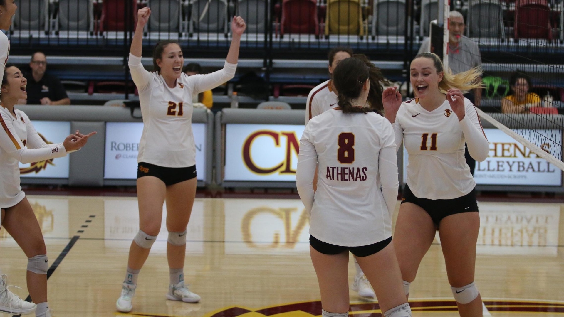 CMS celebrates moving to 7-0 in SCIAC (photo by Stella Cheng)
