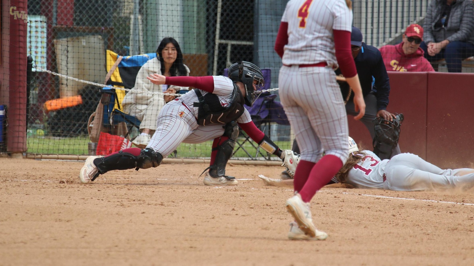 Sarah Loper tags out a run at the plate in the nightcap (photo by Eva Fernandez)