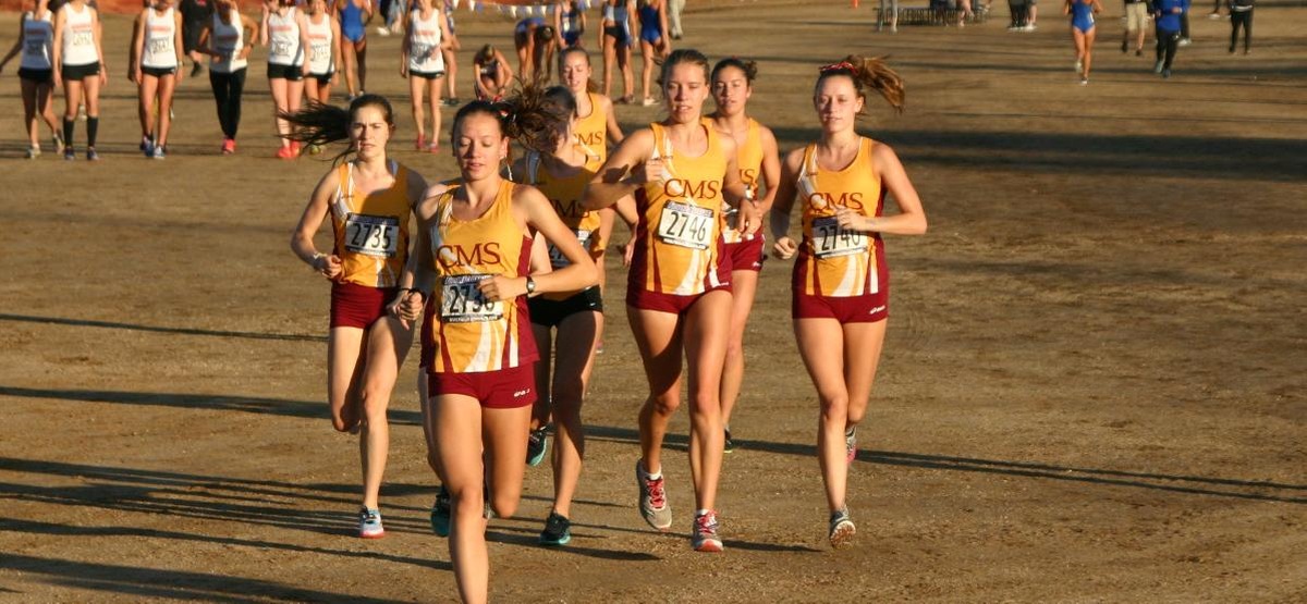 CMS women's cross country runners in a pack